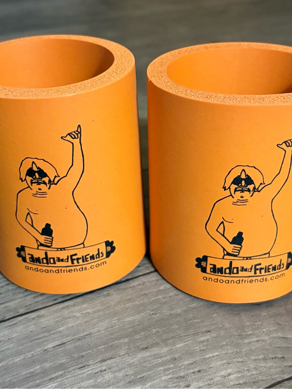 Ando and Friends Orange Koozie Cup Set of 2 NWOT
